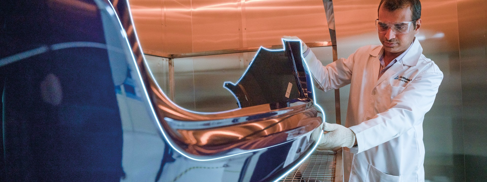 Expert performing environmental impact simulation on components 