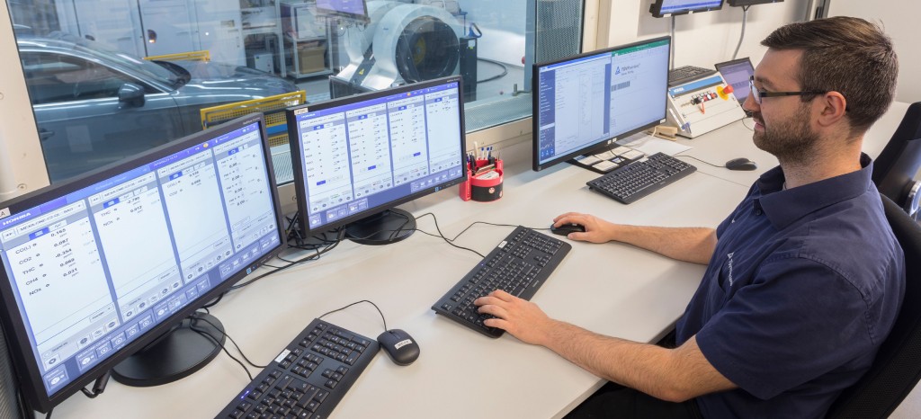 Employee at the control station in the vehicle laboratory