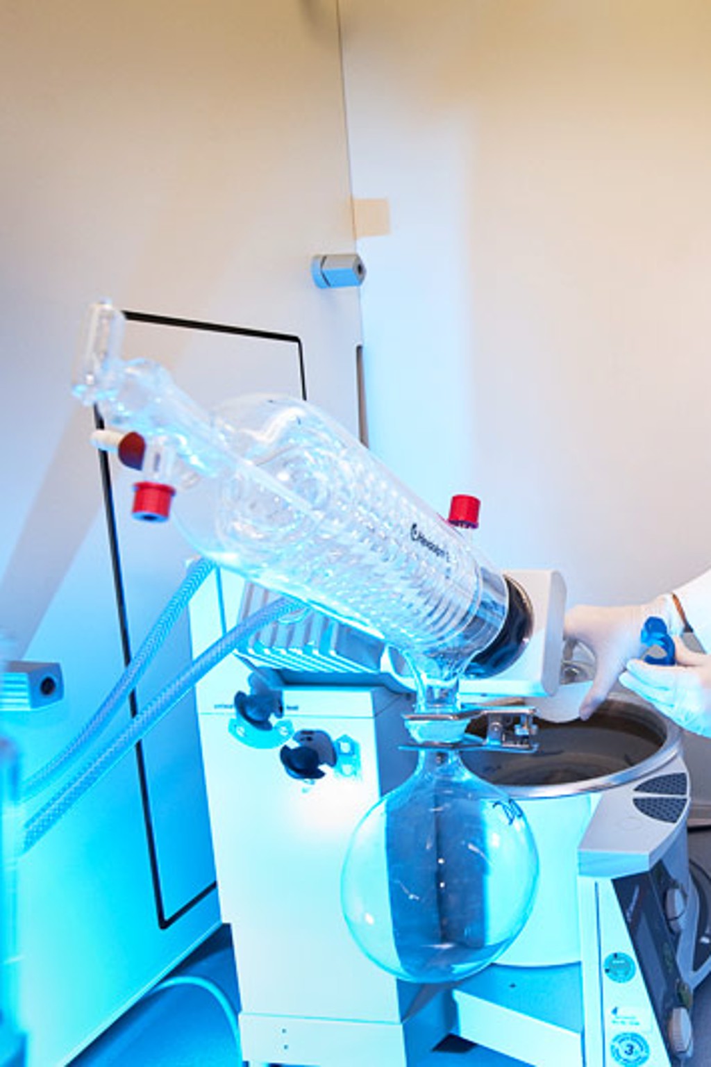 Laboratory technician performing a chemical test.